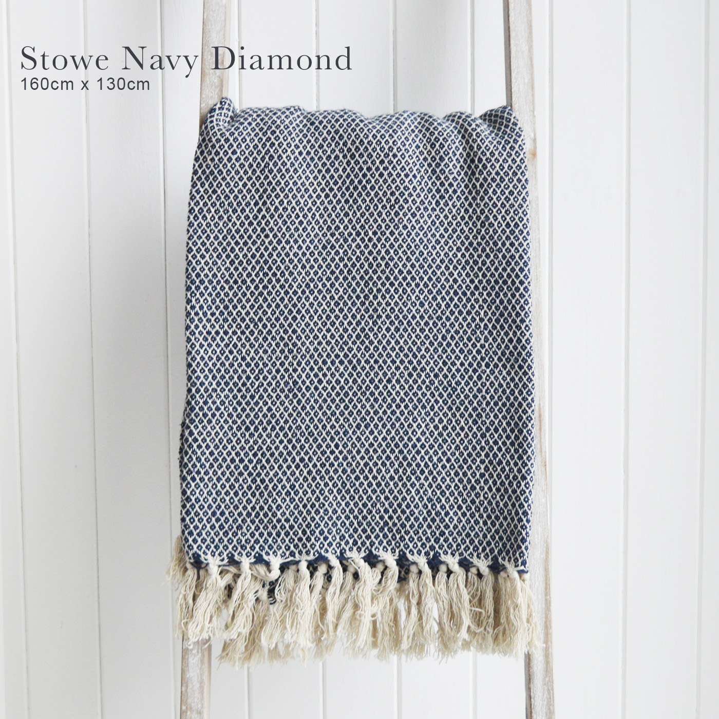 Stowe throws in blues, greys and natural coloures  for interiors in New England styles modern farmhouse, country, coastal and city homes from The White Lighthouse. Furniture and home interiors UK - Navy Blue Diamond Throw